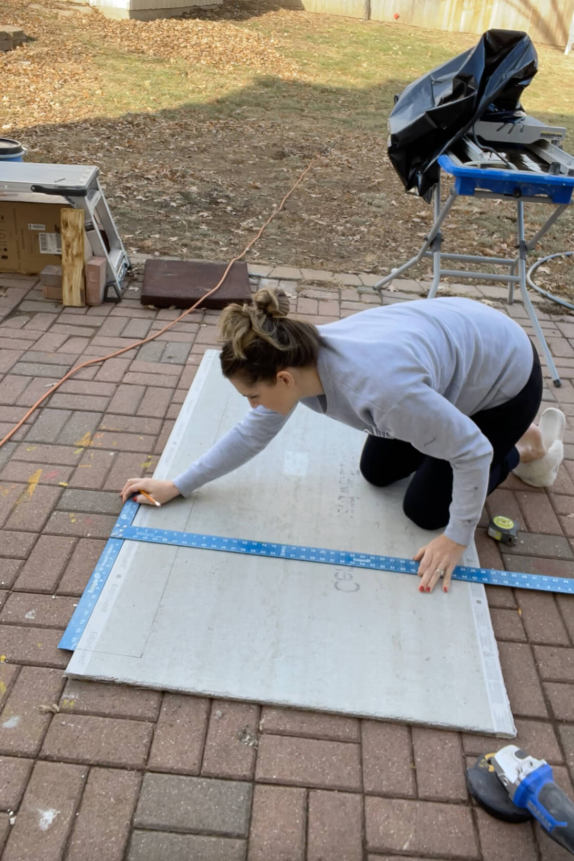 Cutting out cement board for the backing on my stone fireplace surround.